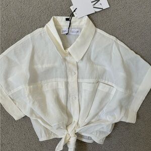 Off white collared top with tie at waist